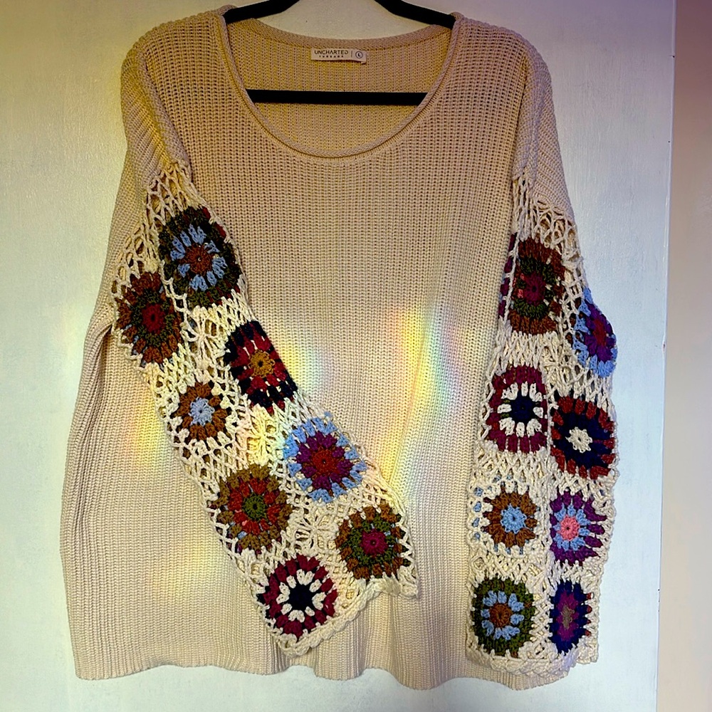 Uncharted Threads size Large Sweater. Cream colored with crocheted bell sleeves.
